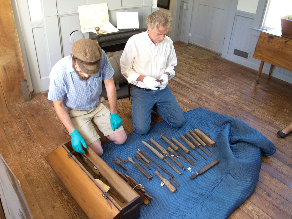 Joshua Klein and Thomas Lie-Nielsen examine Jonathan Fisher's turning tools.