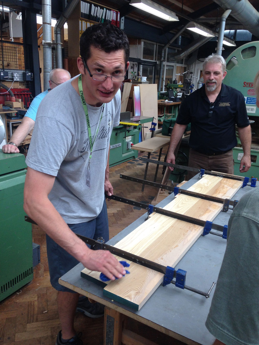 Alex Primmer and Deneb Puchalski during one of the many panel glue-ups last week.